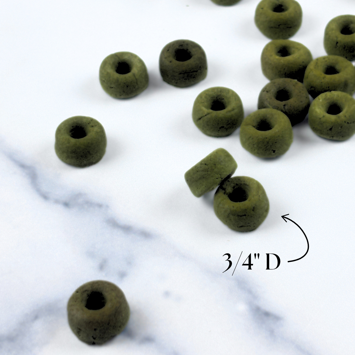 Superfood Spinach, Green Spirulina and Cottage Cheese Healthy Dog Treats in the shape of mini donuts. We call them Daisy Loops a playful color reference to Fruit Loops but for dogs.